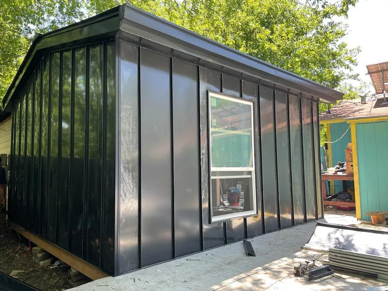 Black standing seam metal wall panels for Roof Inspection in Margate